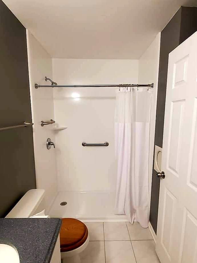 convert tub to walk in shower cost